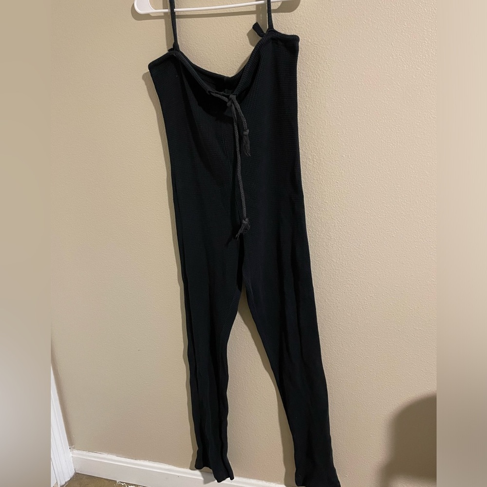 cute black body suit! rips on both sides but can be easily fixed! side medium.
